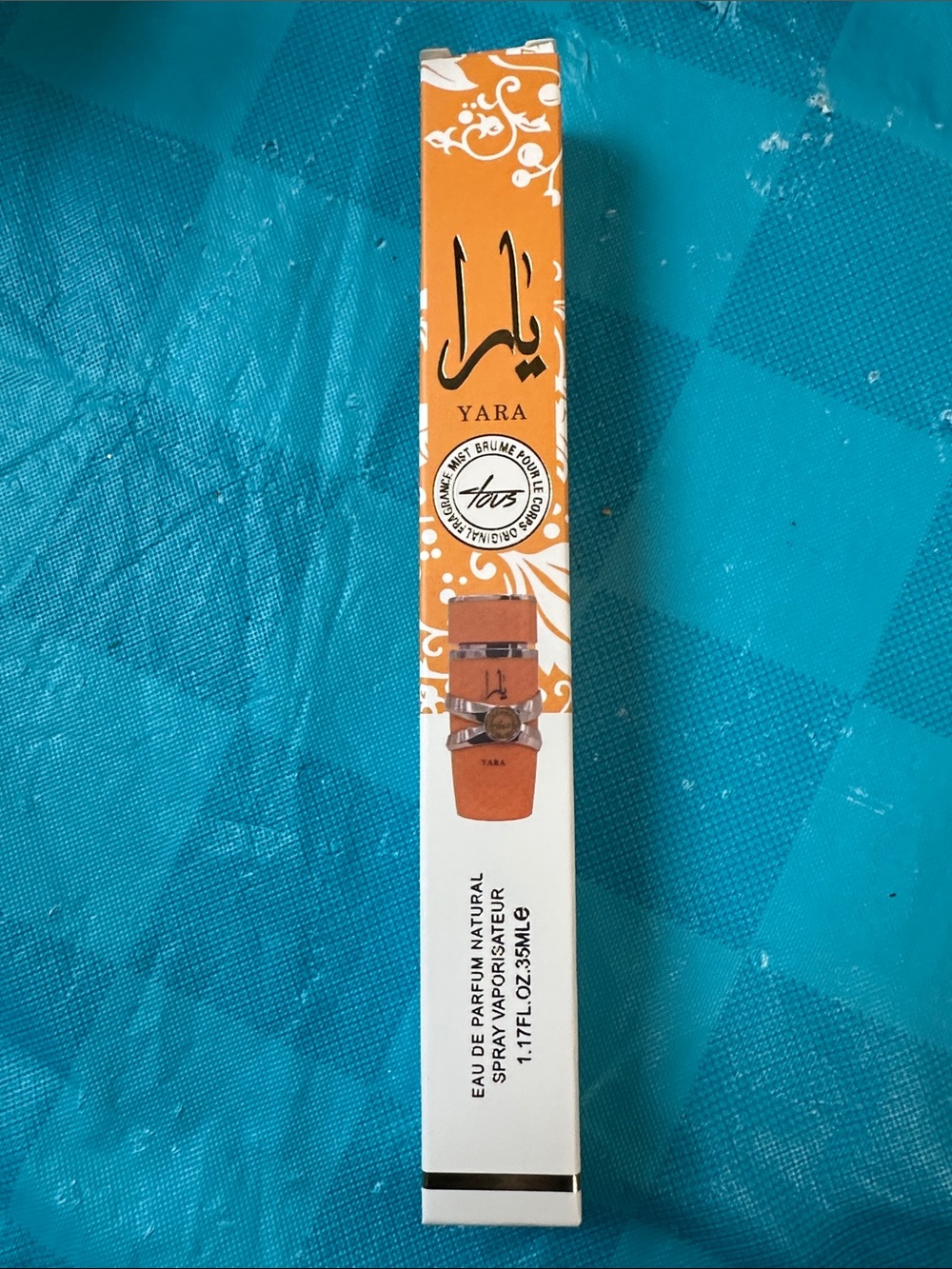 Yara Eau de Parfum Spray - Orange and White Bottle
